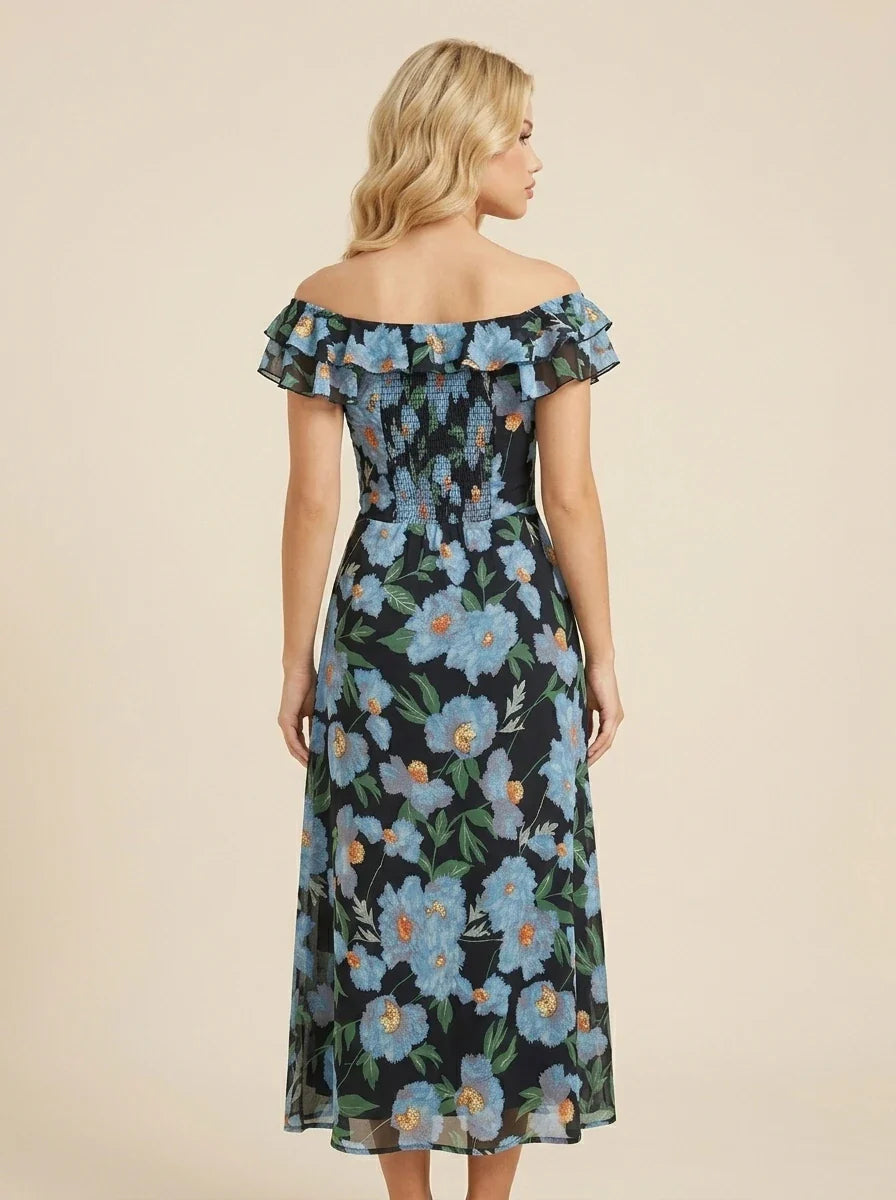 Back view of a woman in a black off-the-shoulder midi dress with a blue floral print and smocked bodice
