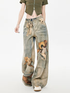 Close-up of the front of wide leg jeans with teddy bear graphic print