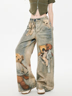 Model posing in wide leg jeans with teddy bear graphic print