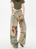 Back view of wide leg jeans with teddy bear graphic print and tie waist