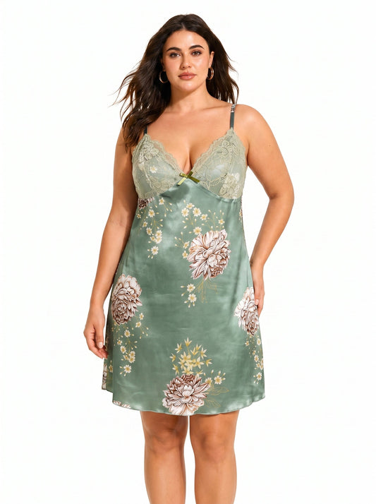 Plus-size model wearing a green satin chemise with a floral print and lace trim