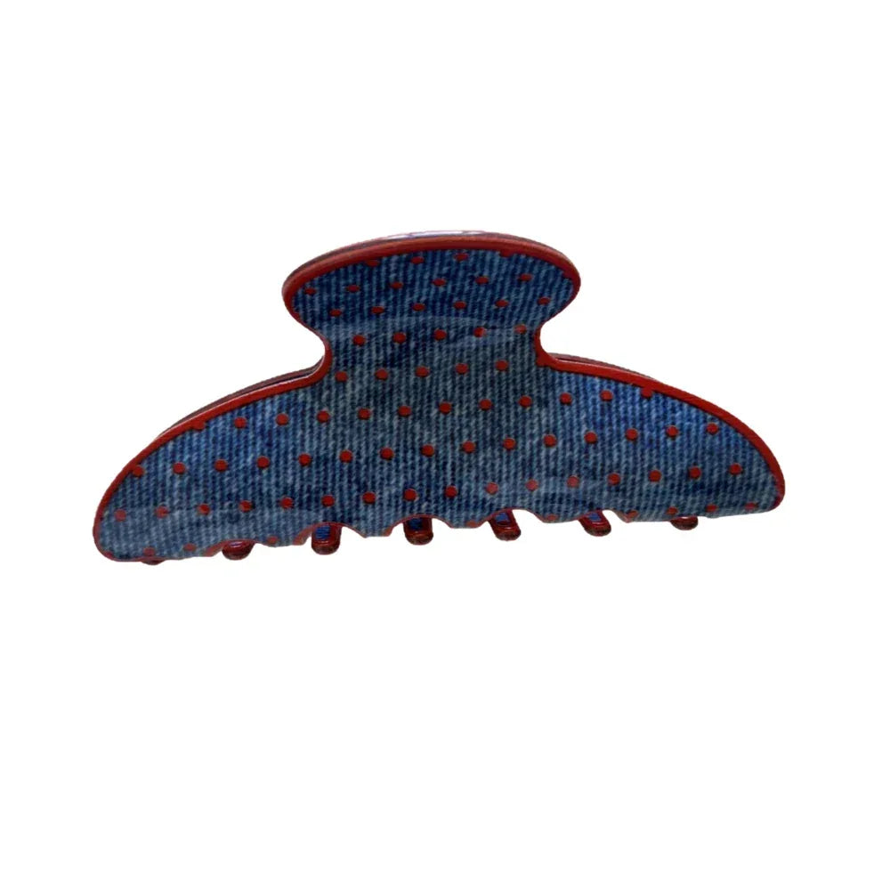 Blue polka dot hair claw clip with red trim