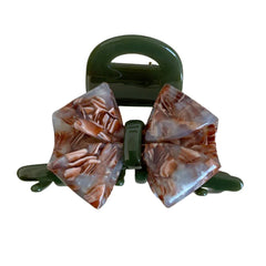 Green bow claw clip with marbled pattern