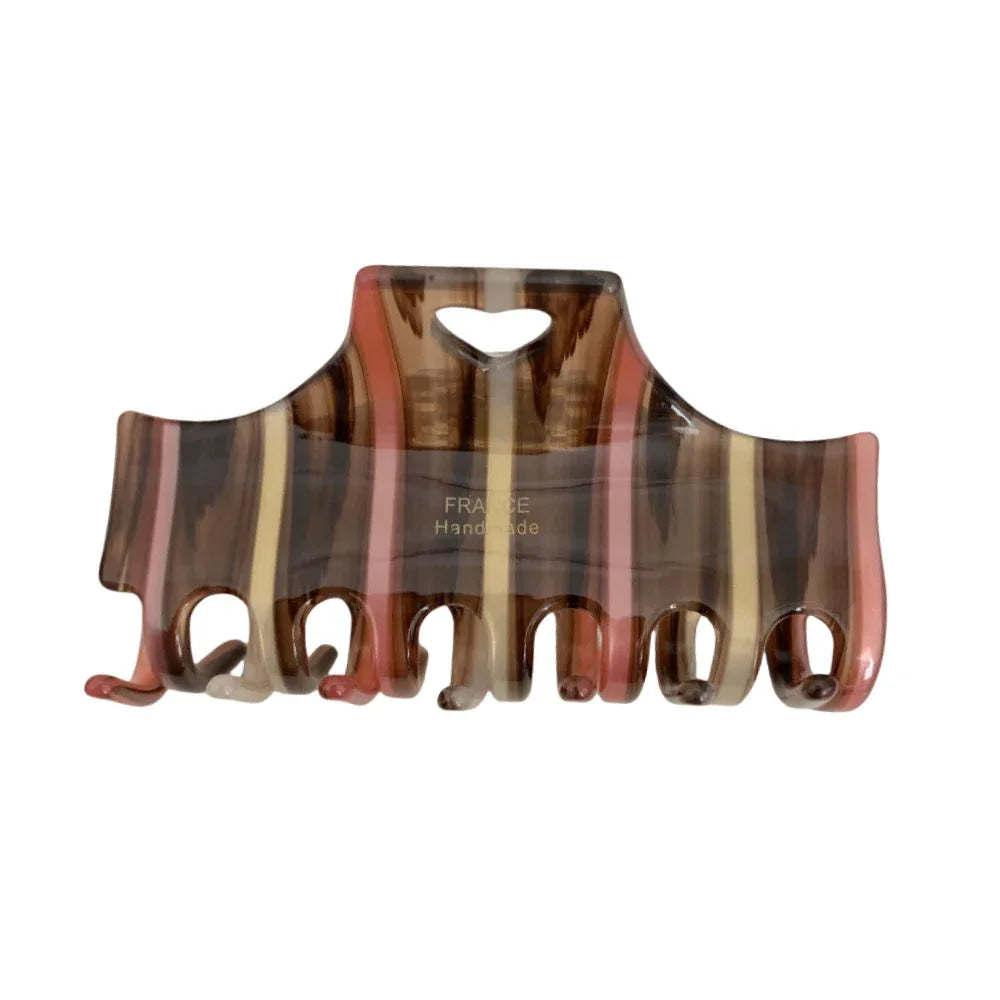 Brown, pink, and yellow striped hair claw clip with heart cutout Main image