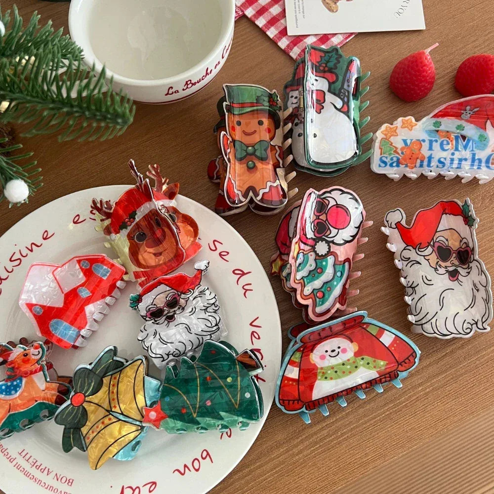 Close-up of various Christmas-themed hair claw clips, including Santa, gingerbread man, and snowman designs, on a white plate.