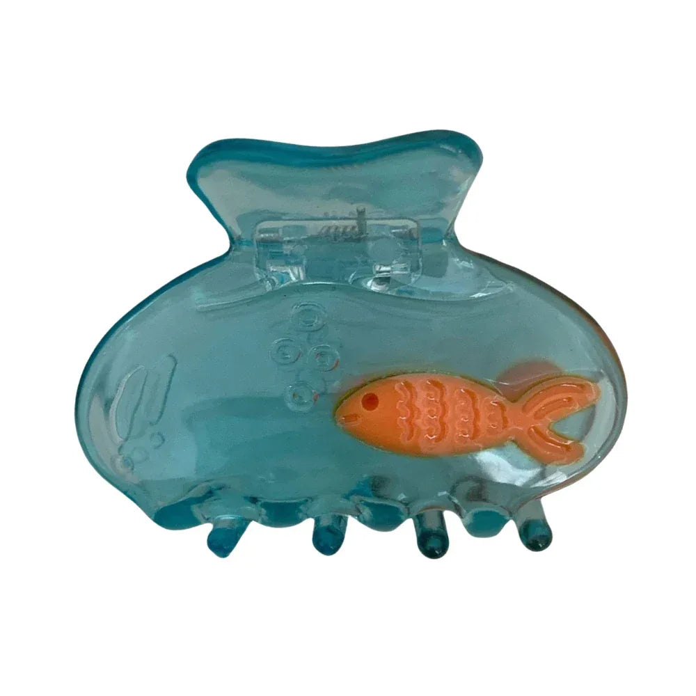 Transparent blue hair claw clip with an orange fish charm inside, featuring bubble details. Main image