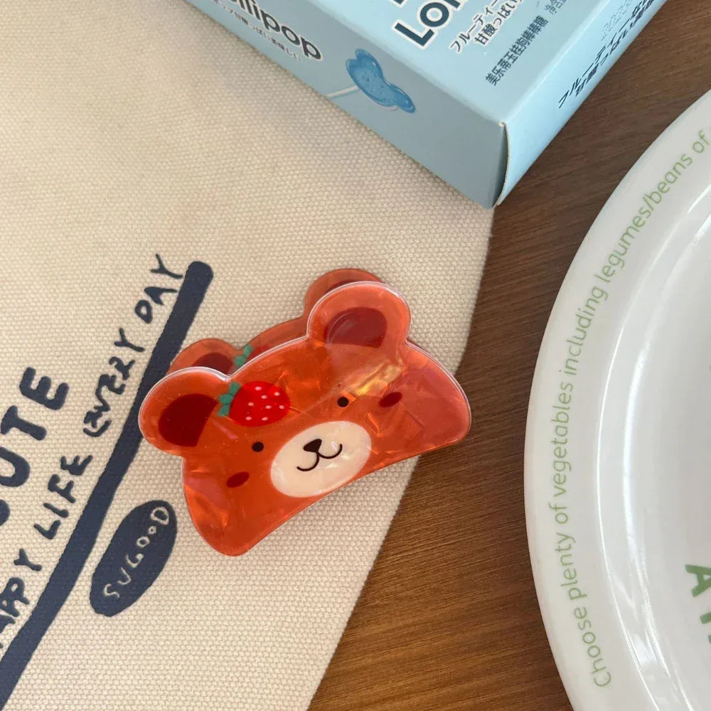 Small animal-shaped hair claw clip made from multicolor cellulose acetate with a glossy finish - View 6 | TEVQA