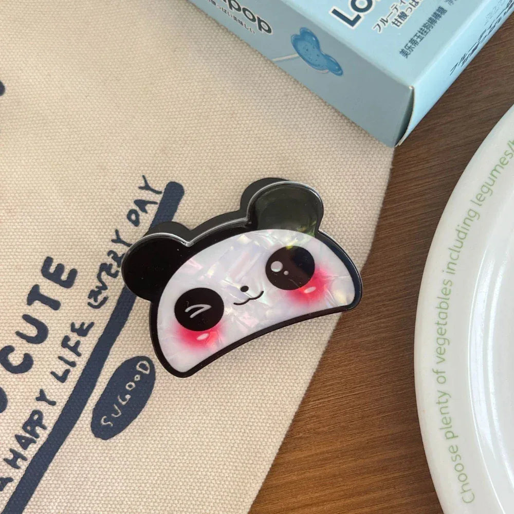 Small animal-shaped hair claw clip made from multicolor cellulose acetate with a glossy finish - View 8 | TEVQA