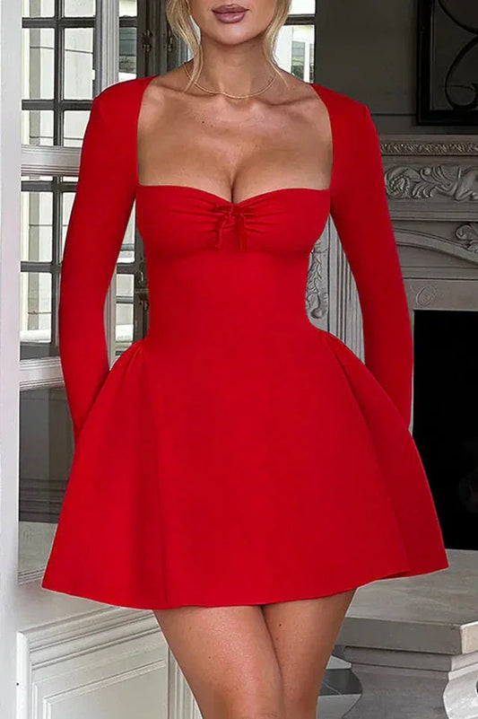 Woman wearing a red long-sleeved square neck mini dress