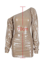 Product image of a sequined one-shoulder dress with a length measurement indicated.