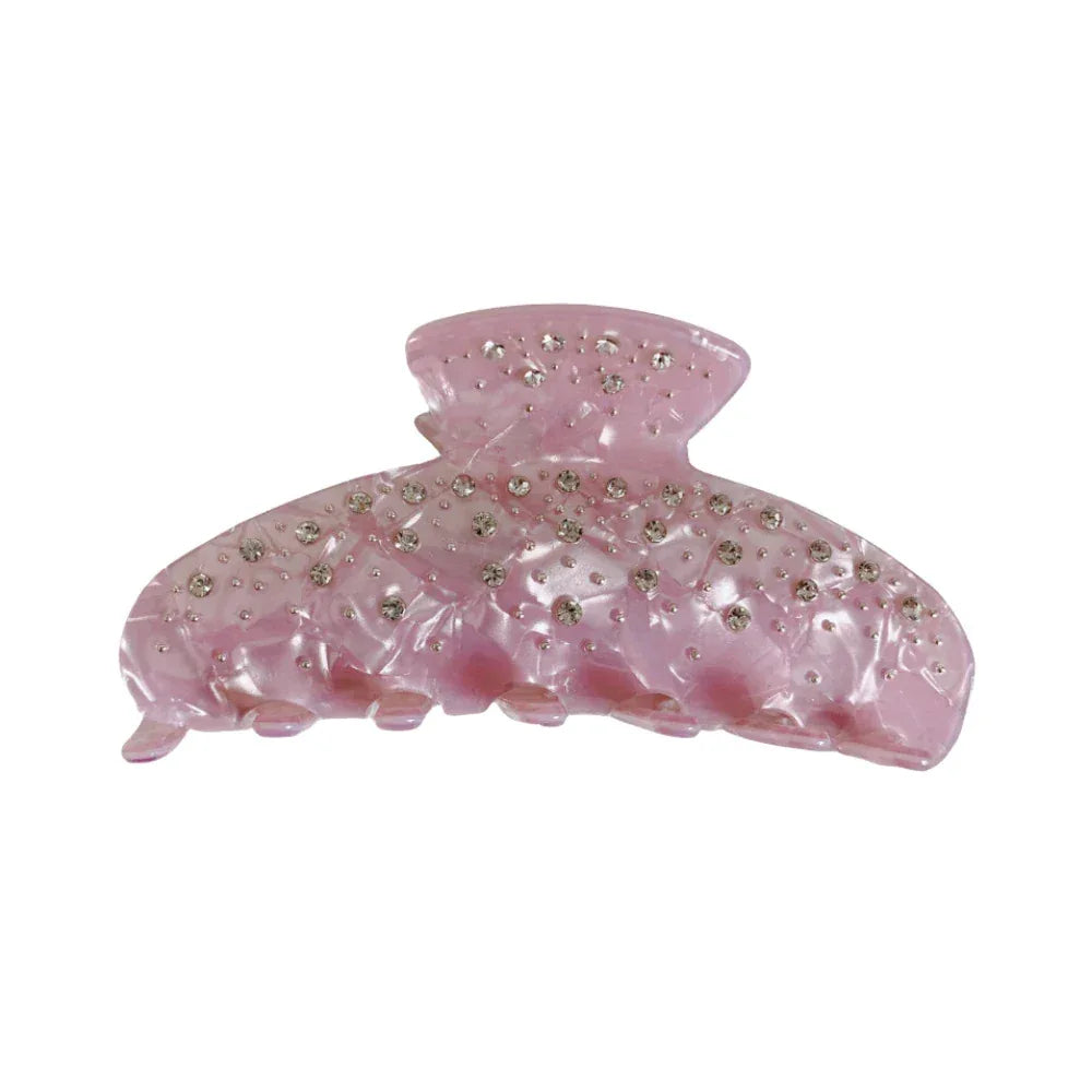 A pink marbled claw clip with rhinestones