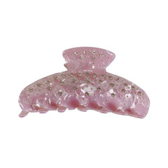 A pink marbled claw clip with rhinestones