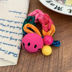 Braided terry cloth hair tie with a yellow smiley face charm - View 8 | TEVQA