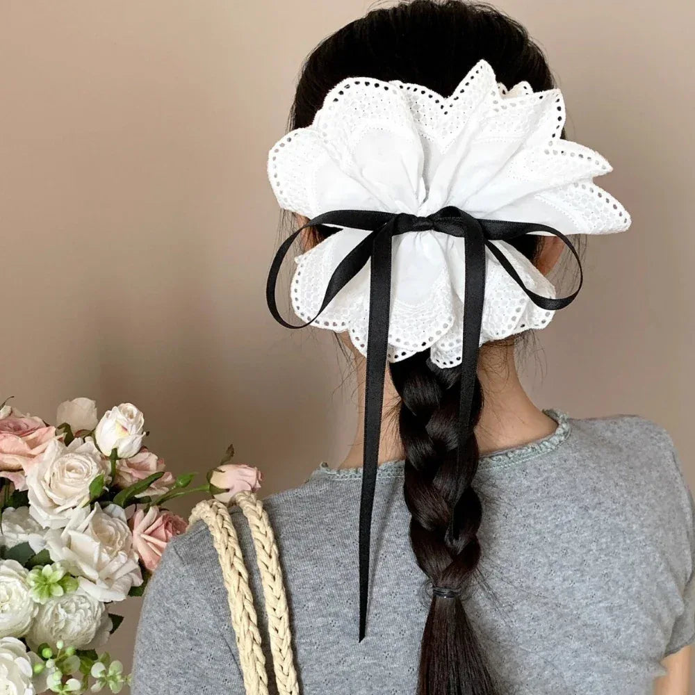 White lace hair claw clip with black bow detail - View 6 | TEVQA