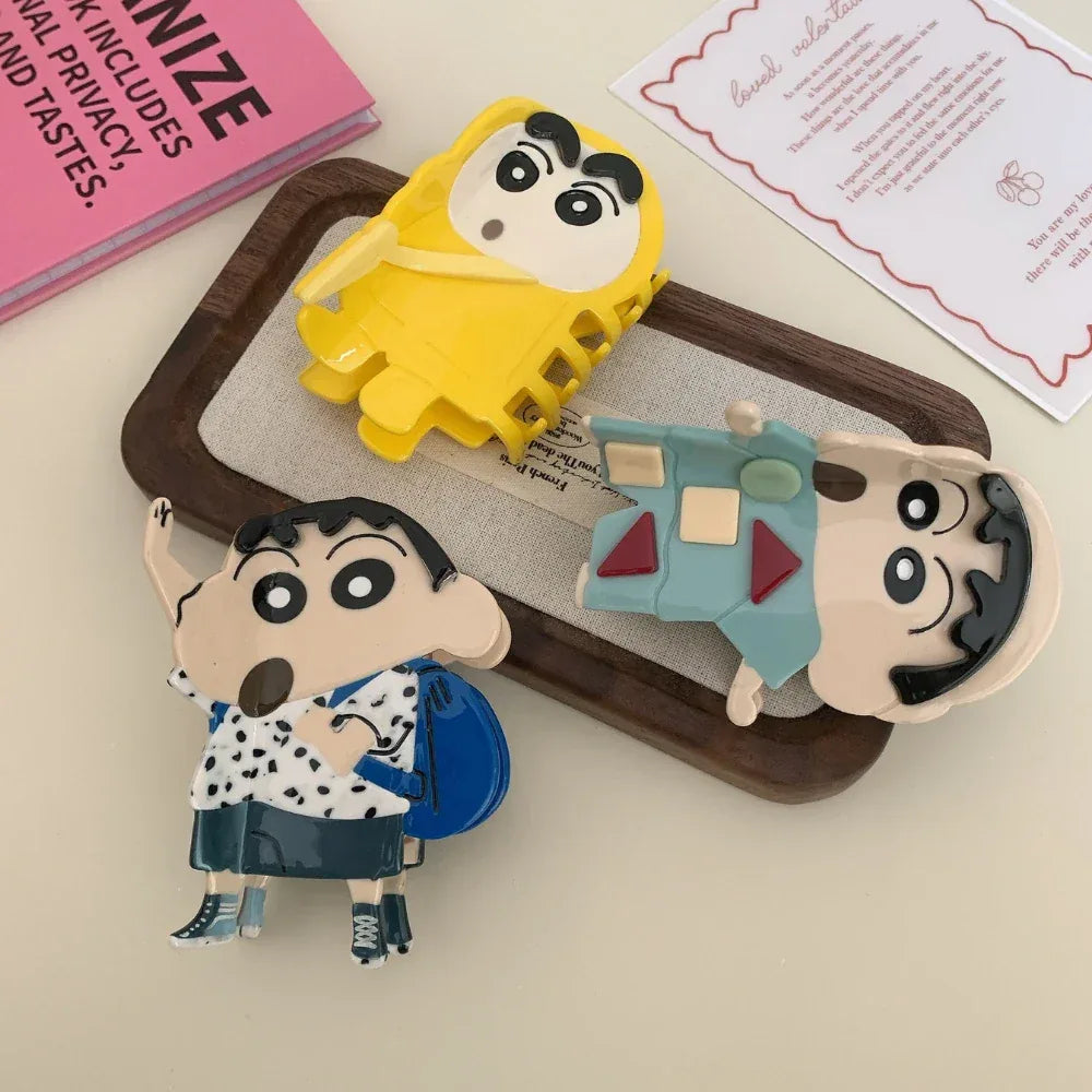 Assortment of Shin Chan character figurines displayed on a tray