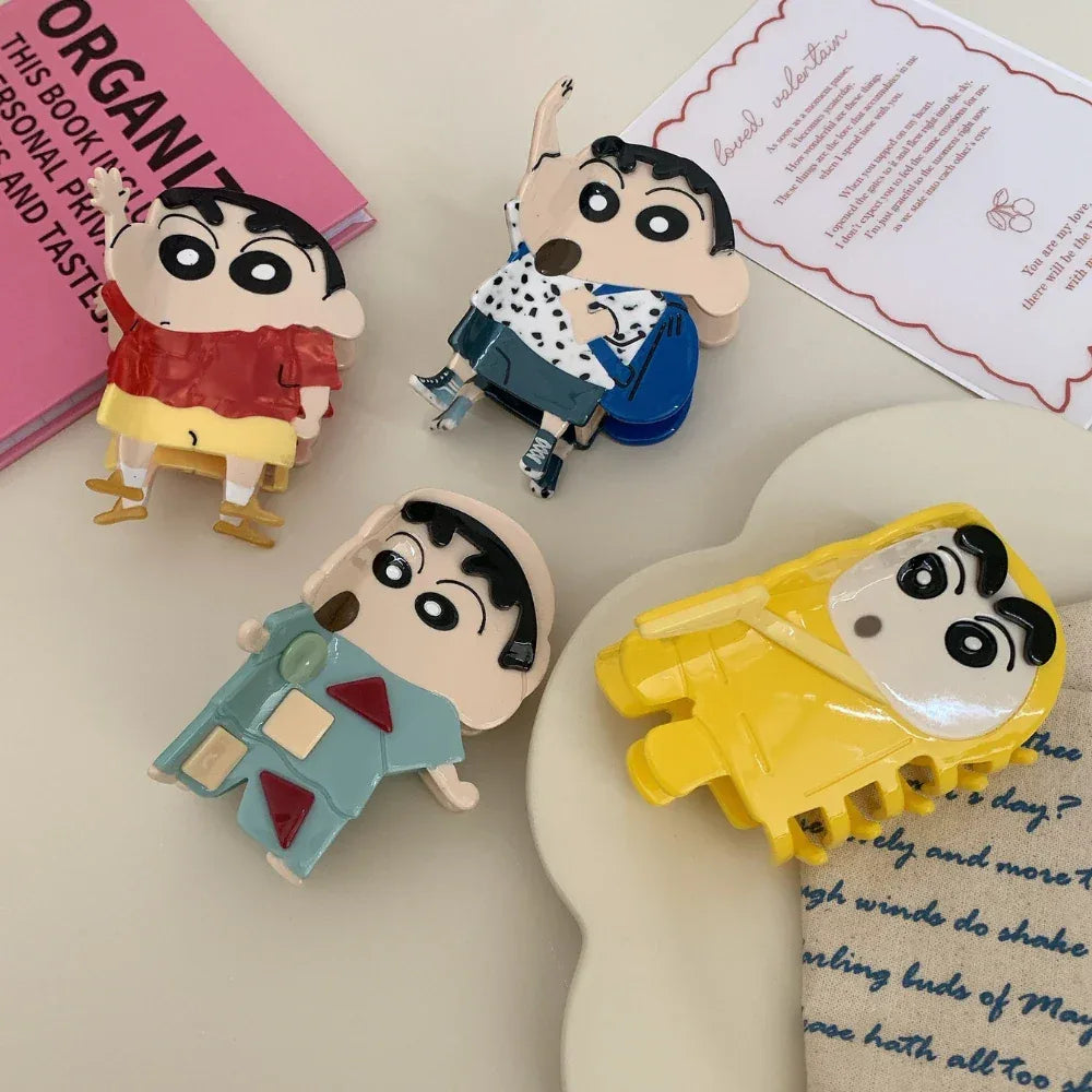 Group of Shin Chan character figurines with surrounding decorative elements