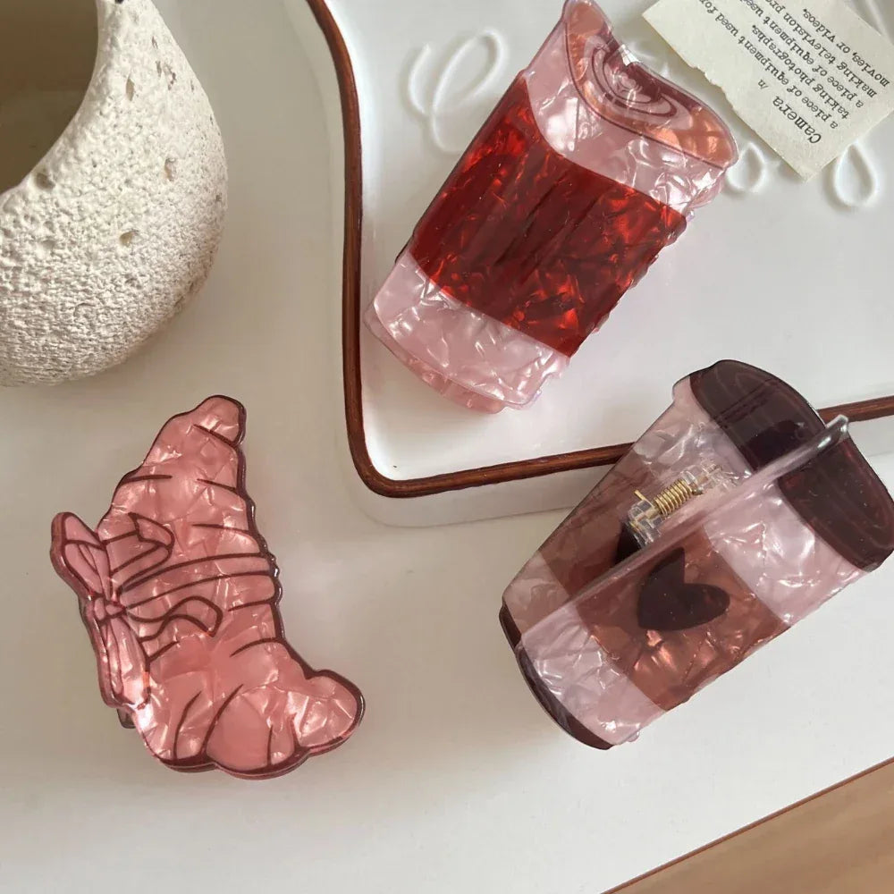 assortment of decorative hair clips on a white surface