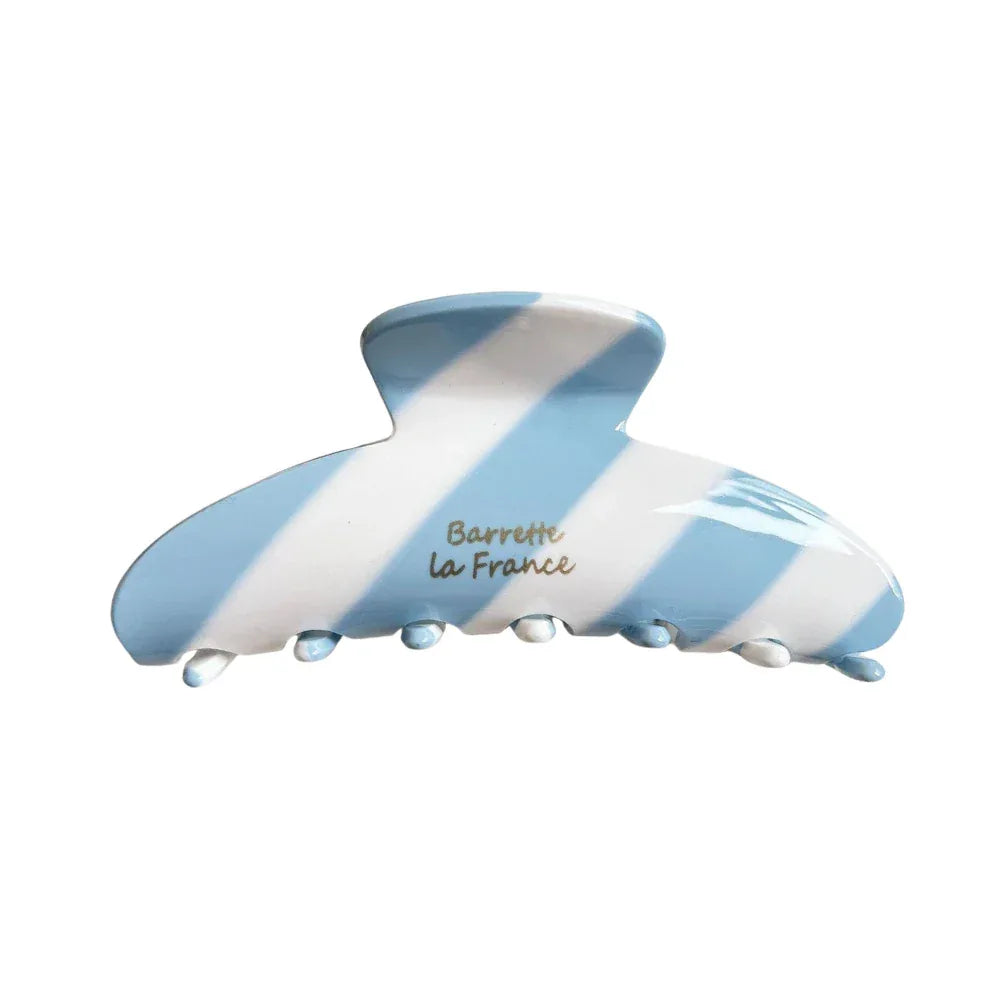 Blue and white striped hair claw clip with logo Main image