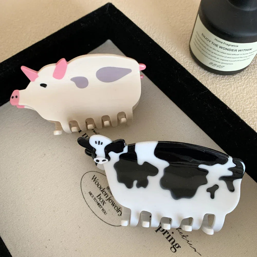 Close-up of a pig hair clip and a cow hair clip