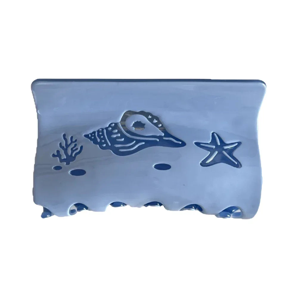 Light blue hair claw clip with a seashell and starfish design