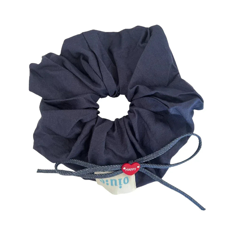 Oversized navy scrunchie with blue tie and red heart charm