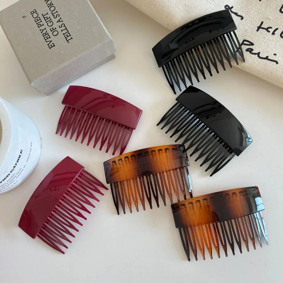 collection of hair combs in black, burgundy, and tortoiseshell patterns Secondary image
