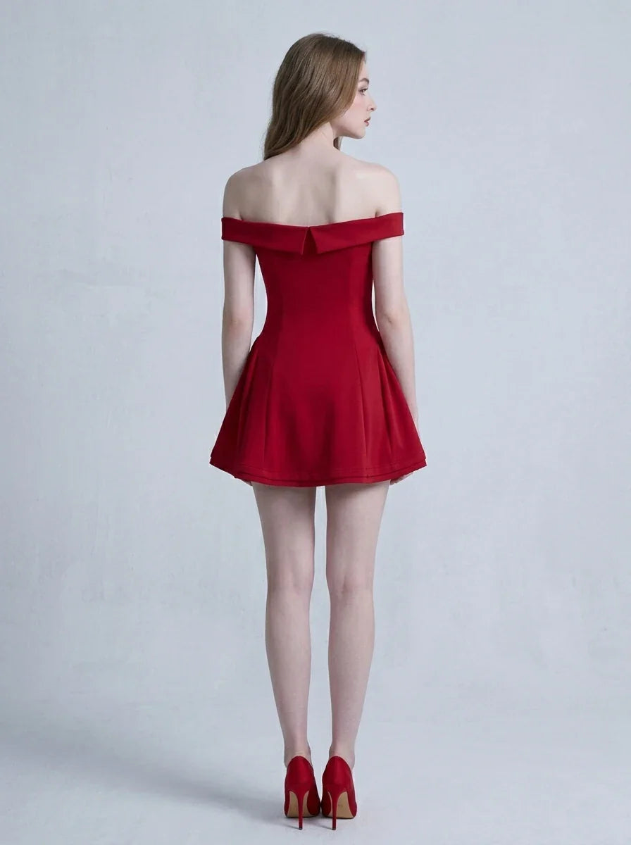 Back view of a woman in a red off-the-shoulder mini dress