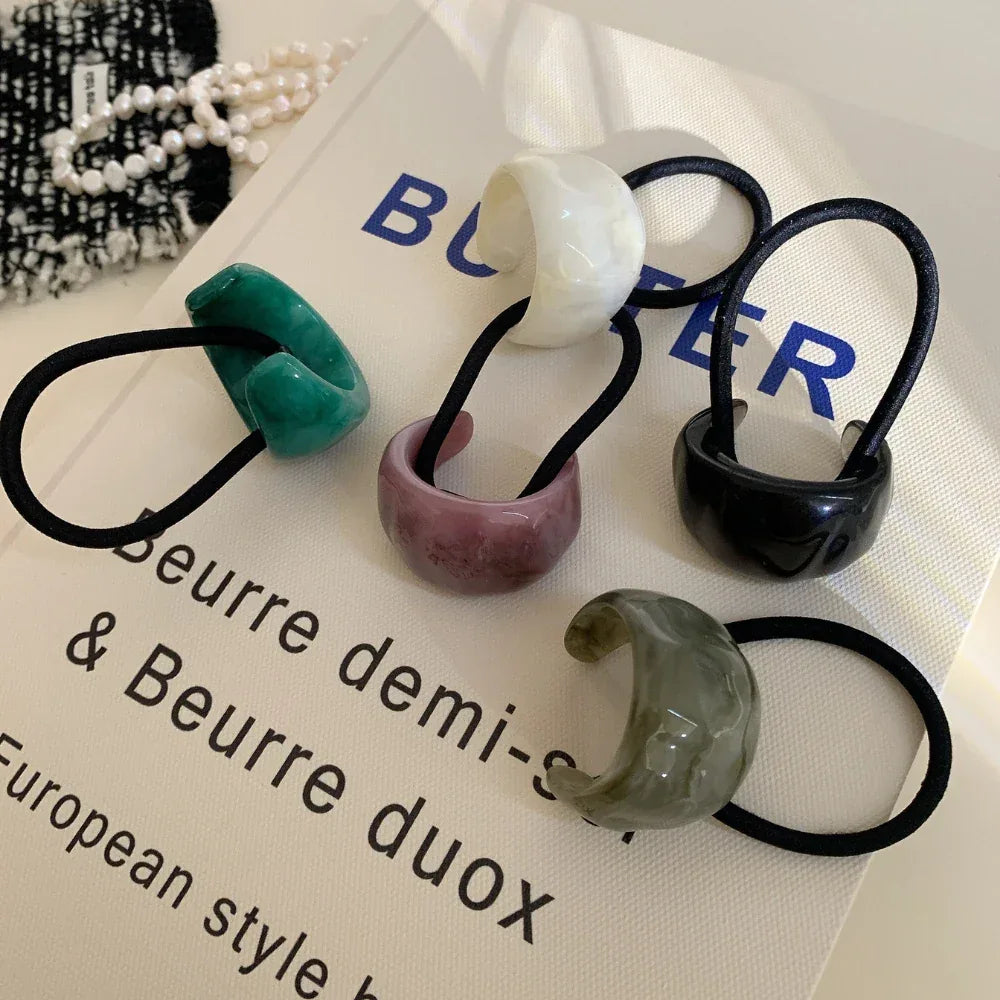 Assortment of resin ring hair ties in various colors