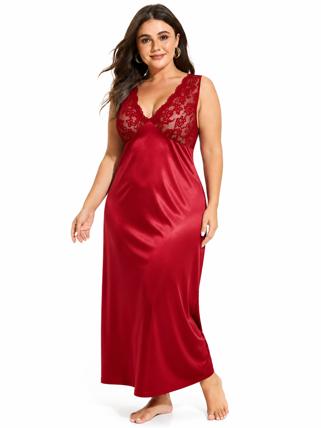 Full body shot of a woman in a red lace and satin nightgown