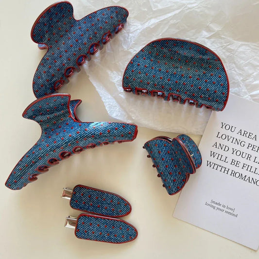 Collection of blue polka dot hair accessories with red trim