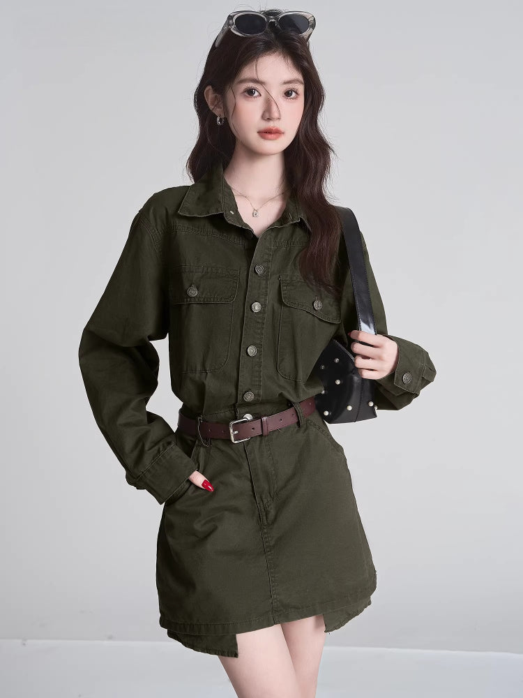 Woman wearing a green button-down shirt and matching mini skirt with a brown belt and black handbag