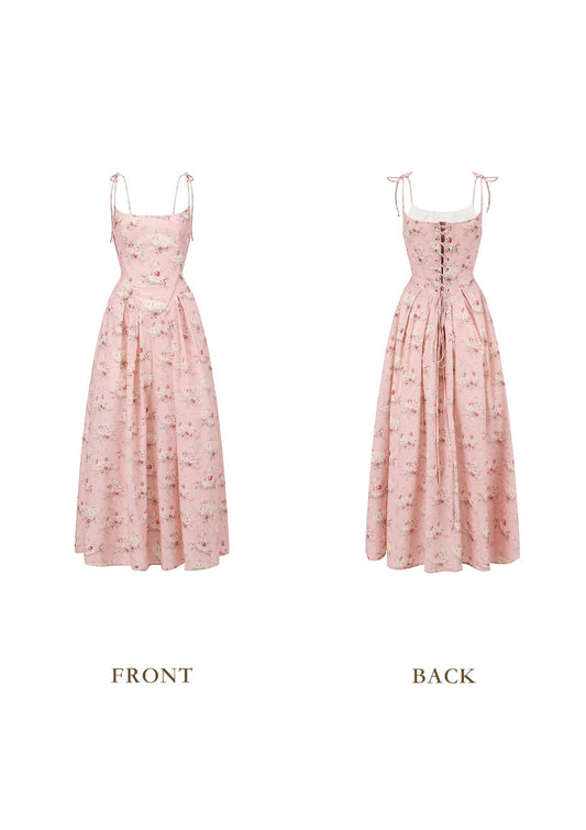 Front view of a pink floral print midi dress with a square neckline and tie straps
