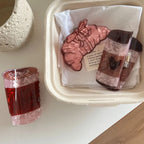 hair clips displayed in a small container