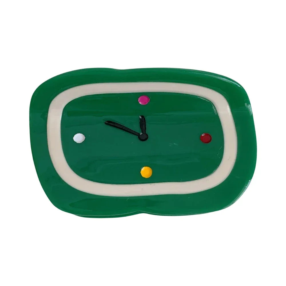 Green clock-shaped hair clip with colorful dots Main image