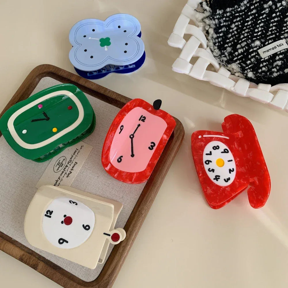 Collection of playful hair clips in various shapes and colors