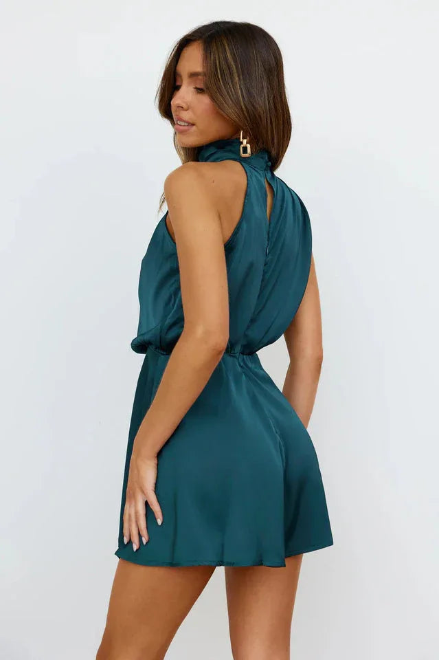 back view of woman in green satin playsuit Secondary image