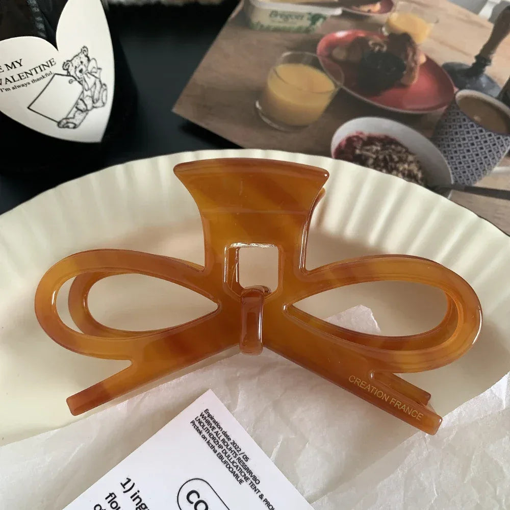 Acetate bow hair claw clip - View 9 | TEVQA
