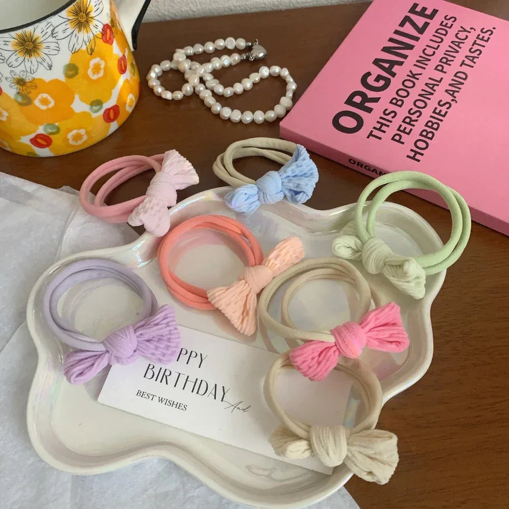 pastel bow hair ties and decorative items