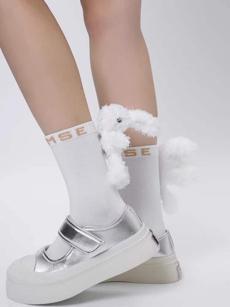 Black cotton crew socks with a 3D fluffy white bunny embellishment and white embroidered lettering on the ribbed cuff. - View 7 | TEVQA