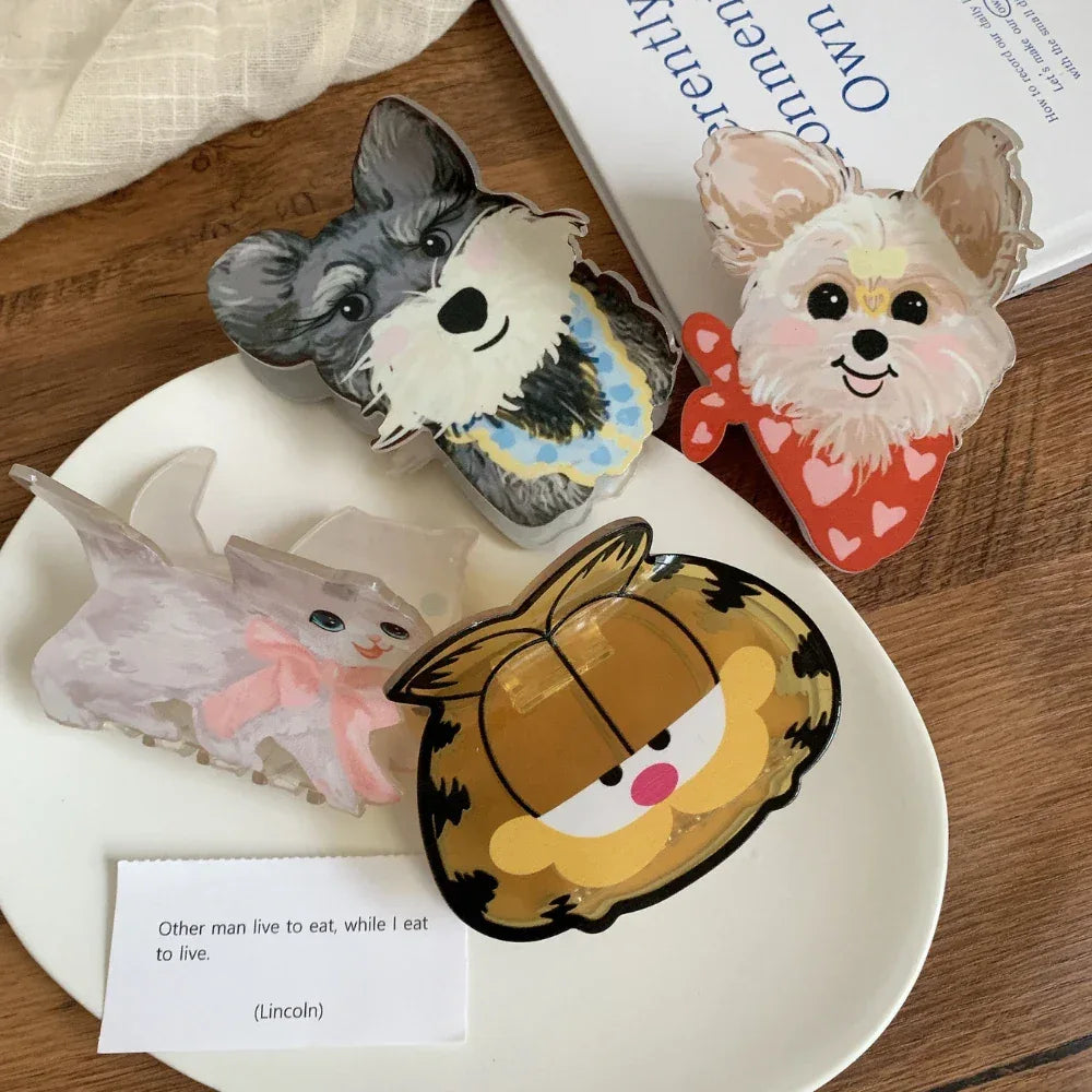 Set of animal-themed hair claw clips including Garfield, a schnauzer, a terrier, and a cat