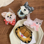 Collection of cute animal hair clips with Garfield, a schnauzer, a terrier, and a cat