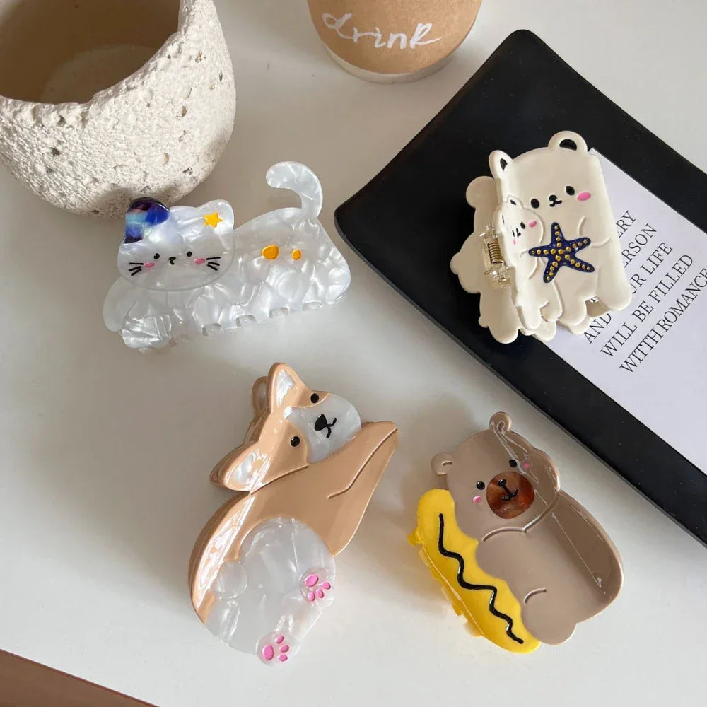 Corgi hair claw clip arranged with other hair accessories