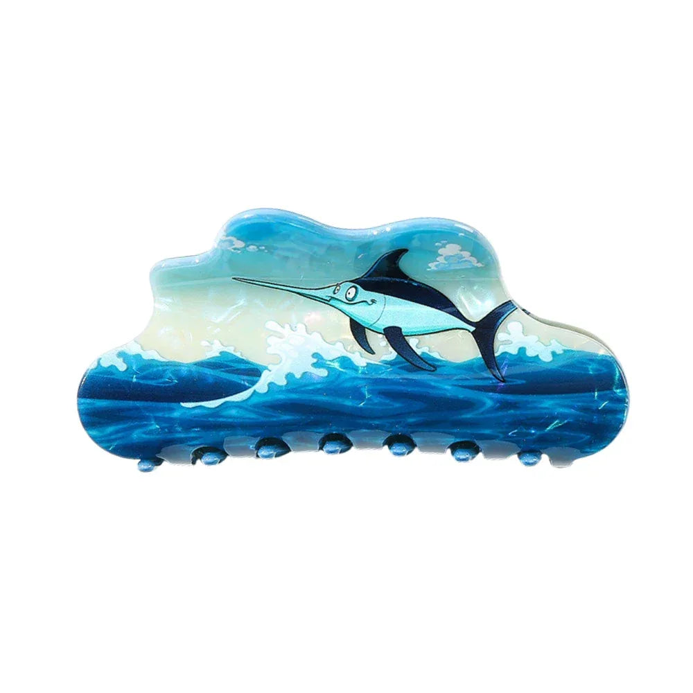 Cloud-shaped hair claw with a swordfish jumping out of blue waves