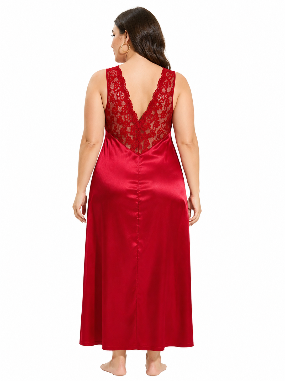 Back view of a woman in a red satin nightgown with a lace V-back