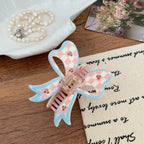 3D acrylic hair claw clip with bow and butterfly design - View 7 | TEVQA