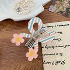 3D acrylic hair claw clip with bow and butterfly design - View 8 | TEVQA