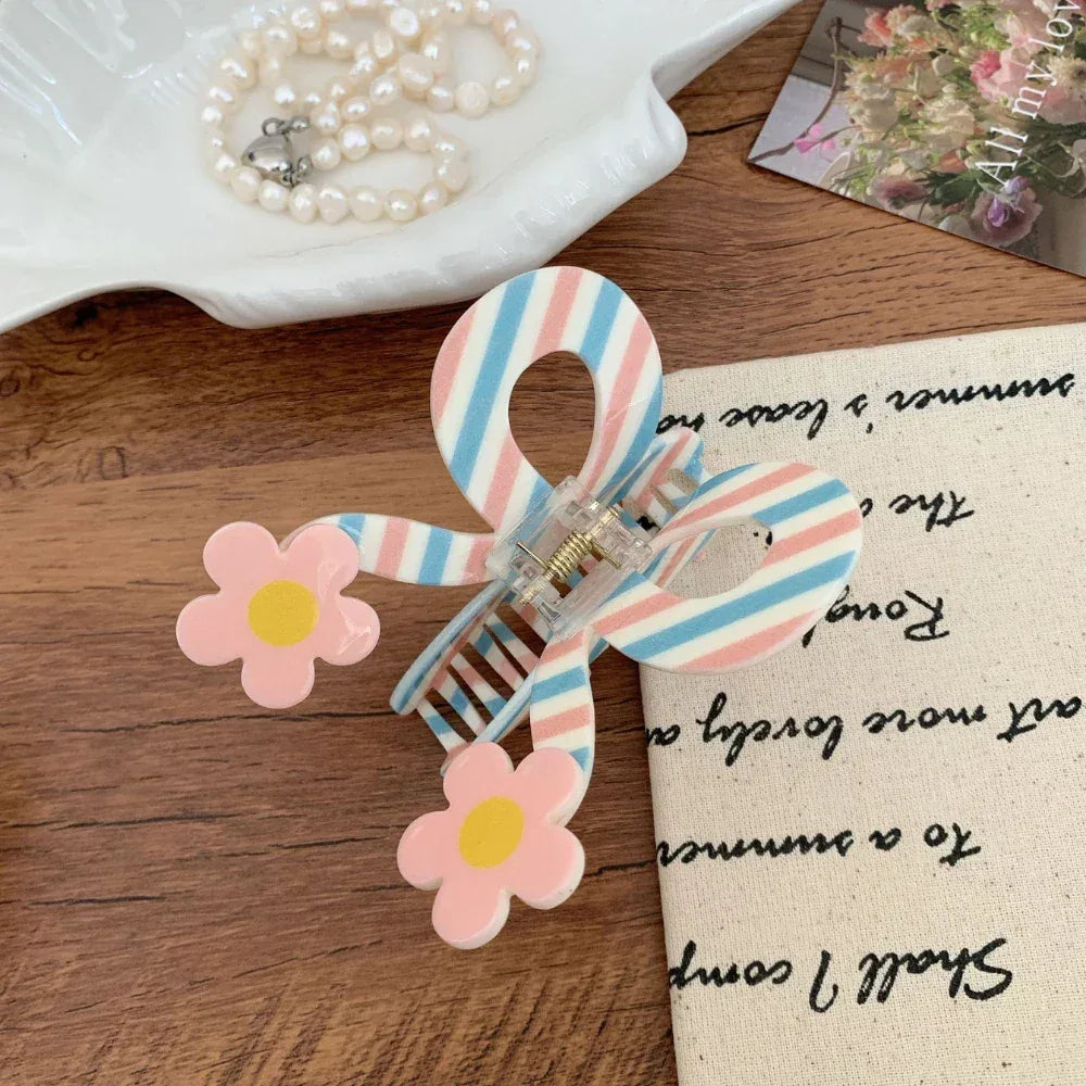 3D acrylic hair claw clip with bow and butterfly design - View 8 | TEVQA