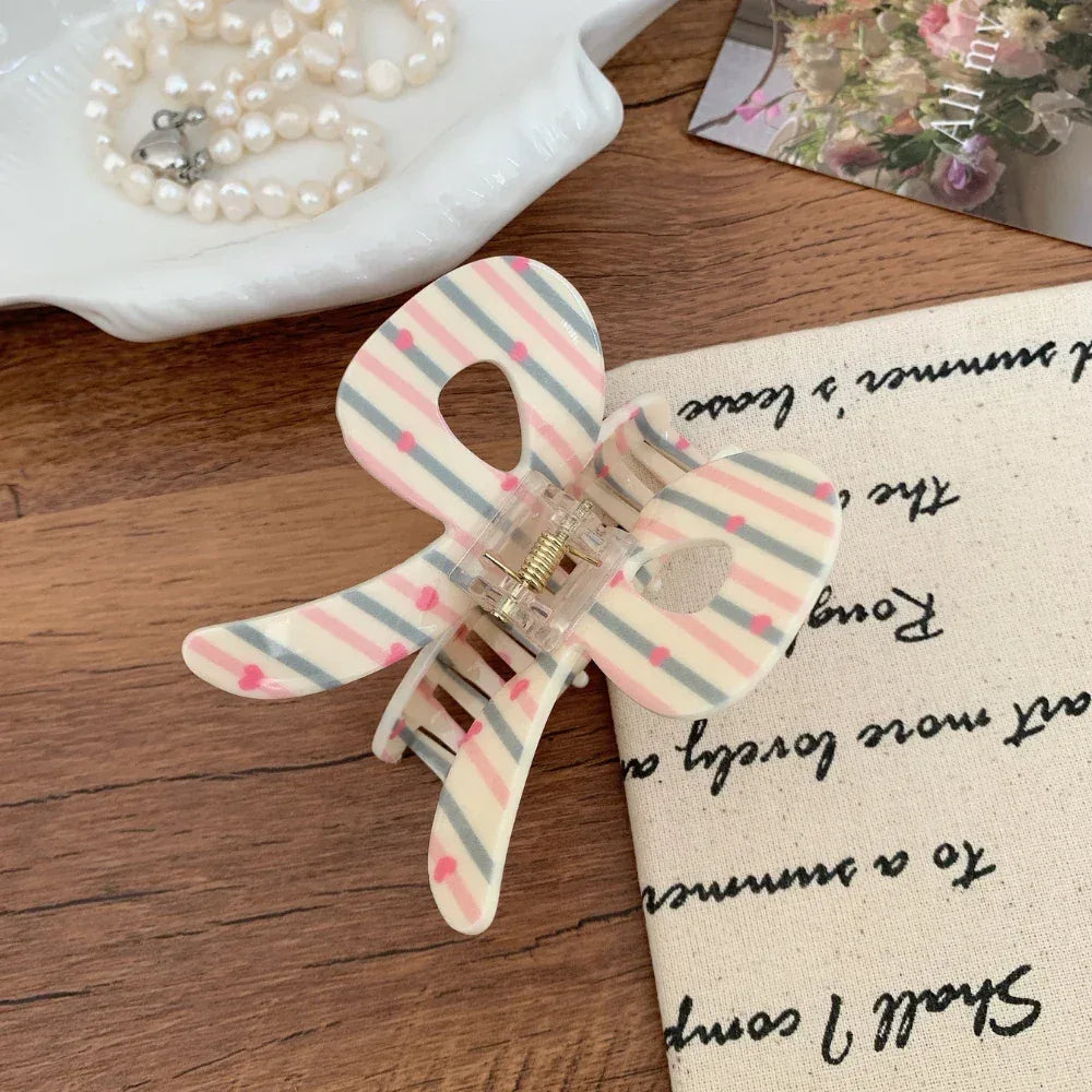 3D acrylic hair claw clip with bow and butterfly design - View 6 | TEVQA
