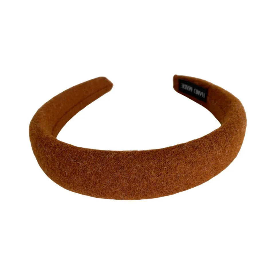 Brown padded headband with 'Hand Made' tag. Main image