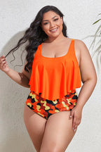 Plus-size woman wearing an orange ruffle tankini top with camouflage bottoms